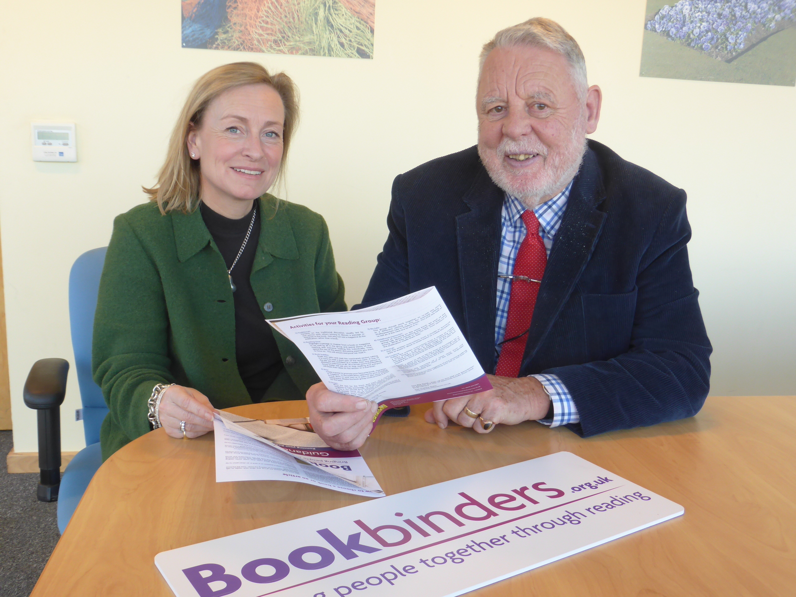 Terry Waite CBE and KM Group chairman Geraldine Allinson discuss the Bookbinders literacy scheme.