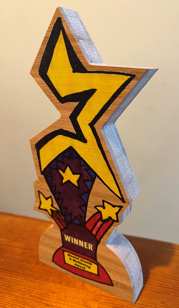 The trophy designed by a student two years ago. You can see how the design allows it to stand.